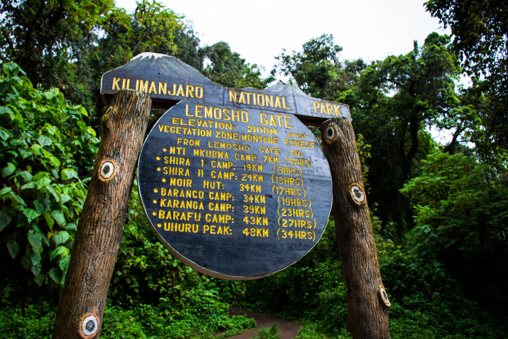 a sign with text on it of lemosho gate